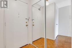 Inside suite 202 w/mirrored closet doors -