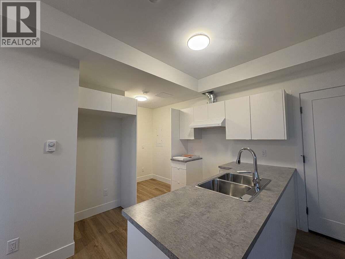 2140 Montenegro Drive, Kelowna, BC - Indoor Photo Showing Kitchen With Double Sink