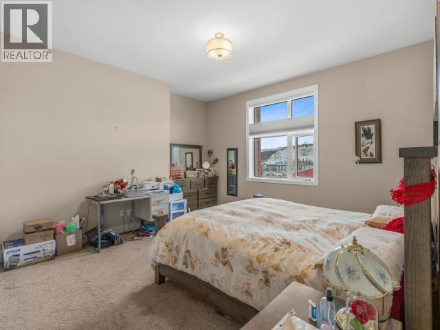 405-38 Waterfront Place, Whitehorse, YT - Indoor Photo Showing Bedroom