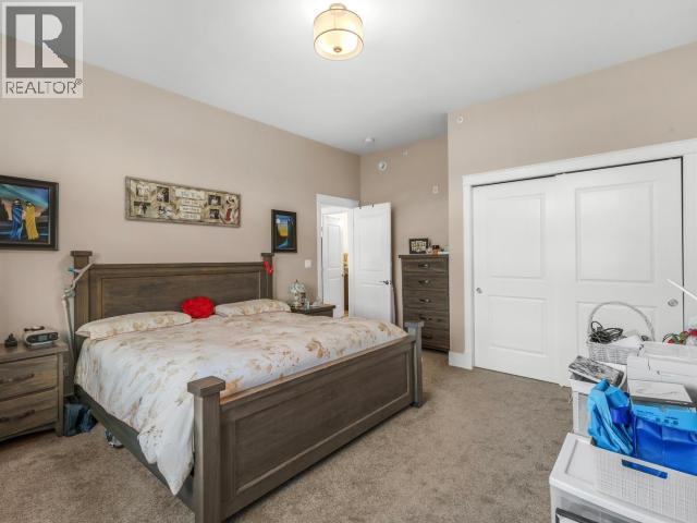 405-38 Waterfront Place, Whitehorse, YT - Indoor Photo Showing Bedroom