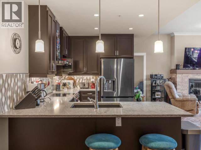 405-38 Waterfront Place, Whitehorse, YT - Indoor Photo Showing Kitchen With Stainless Steel Kitchen With Double Sink With Upgraded Kitchen