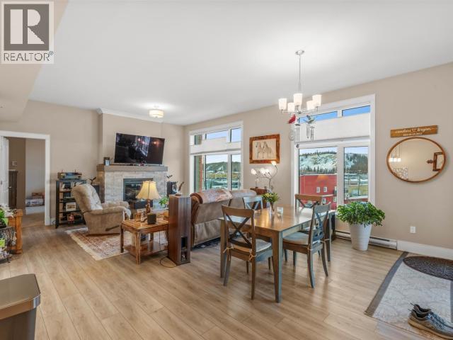 405-38 Waterfront Place, Whitehorse, YT - Indoor Photo Showing Other Room With Fireplace