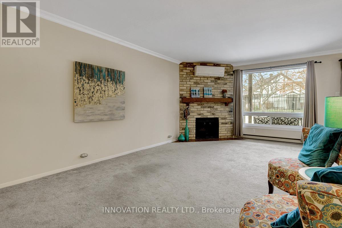 B - 216 Equestrian Drive, Ottawa, ON - Indoor Photo Showing Living Room With Fireplace