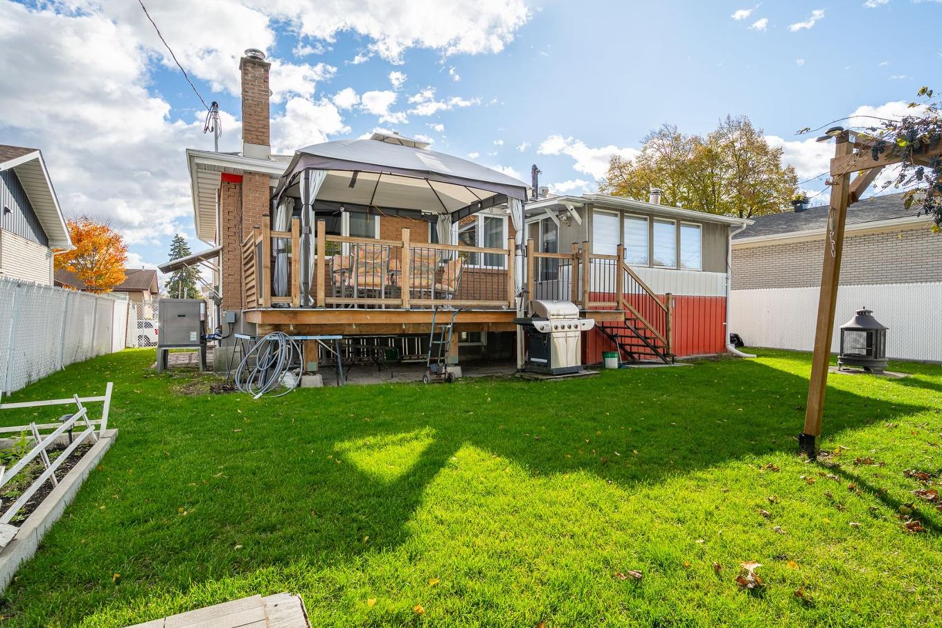 Face arrière - 4517 8E Rue, Laval (Chomedey), QC - Outdoor With Deck Patio Veranda