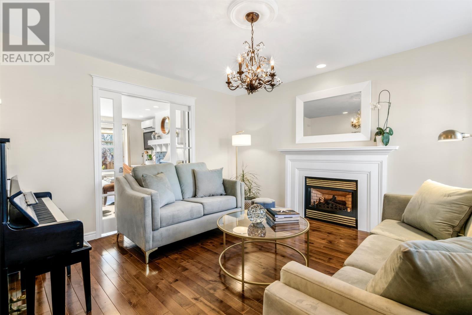 11 Oakley Place, St. John'S, NL - Indoor Photo Showing Living Room With Fireplace