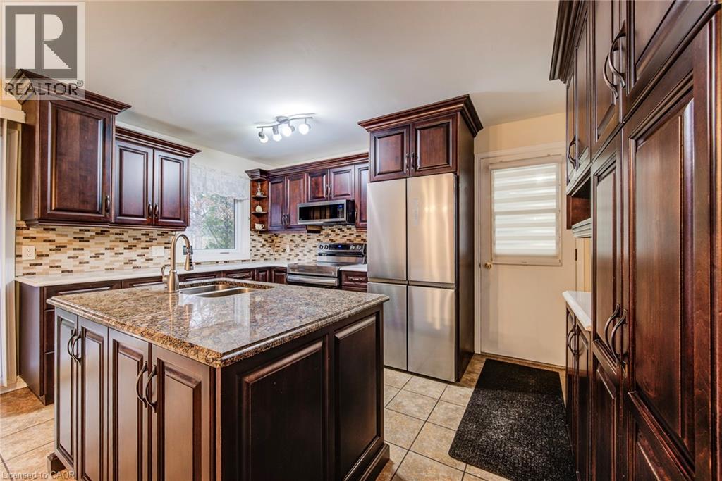1939 Maplewood Road, St. Clements, ON - Indoor Photo Showing Kitchen With Double Sink