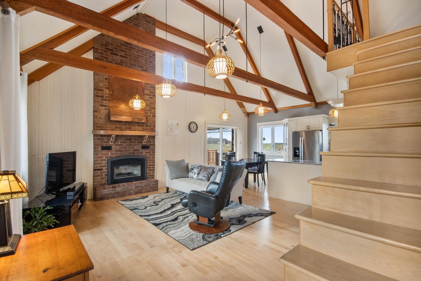 Salon - 480 Rue Brisebois, Saint-Jean-Sur-Richelieu, QC - Indoor Photo Showing Other Room With Fireplace