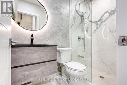 Main level full bathroom w/curb less shower -