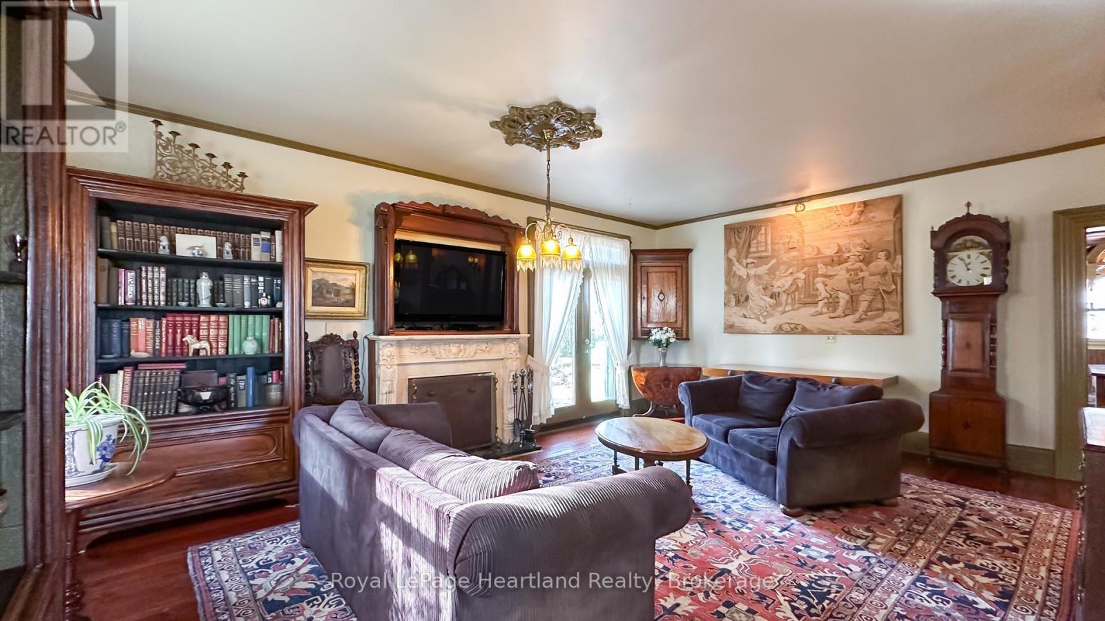 85411 Mcdonald Lane, Ashfield-Colborne-Wawanosh (Ashfield), ON - Indoor Photo Showing Living Room With Fireplace