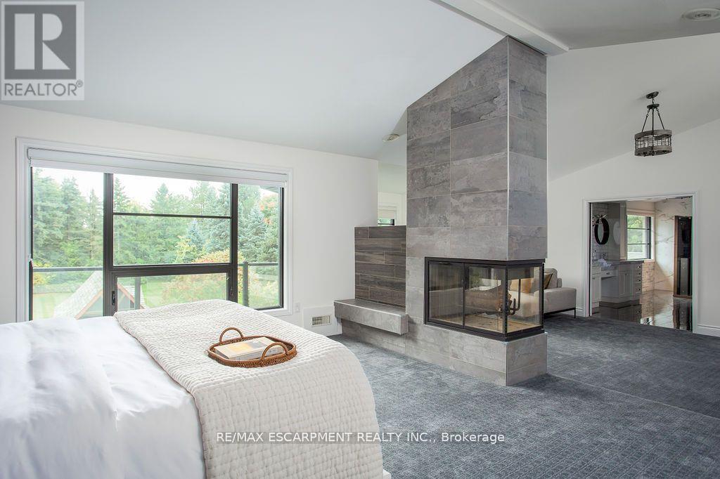 12 Blackberry Place, Hamilton, ON - Indoor Photo Showing Bedroom With Fireplace