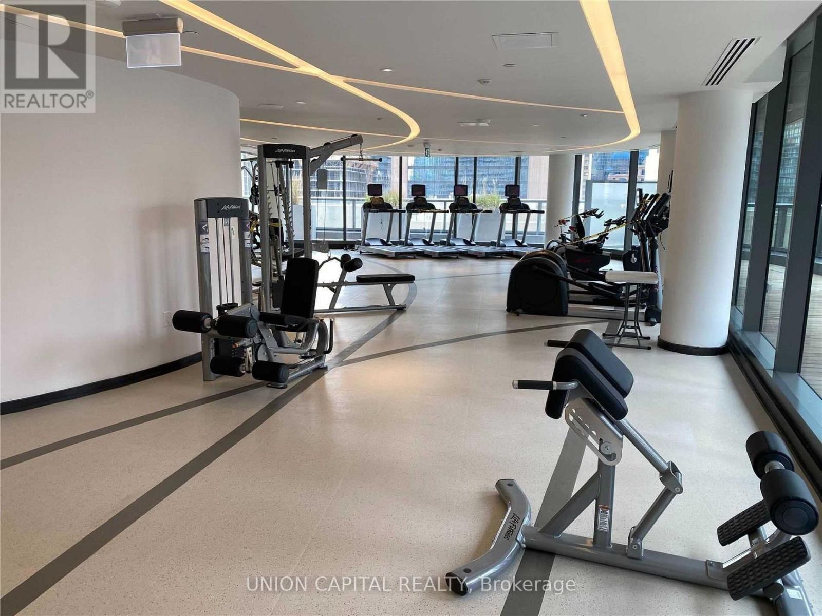 4909 - 11 Wellesley Street W, Toronto, ON - Indoor Photo Showing Gym Room