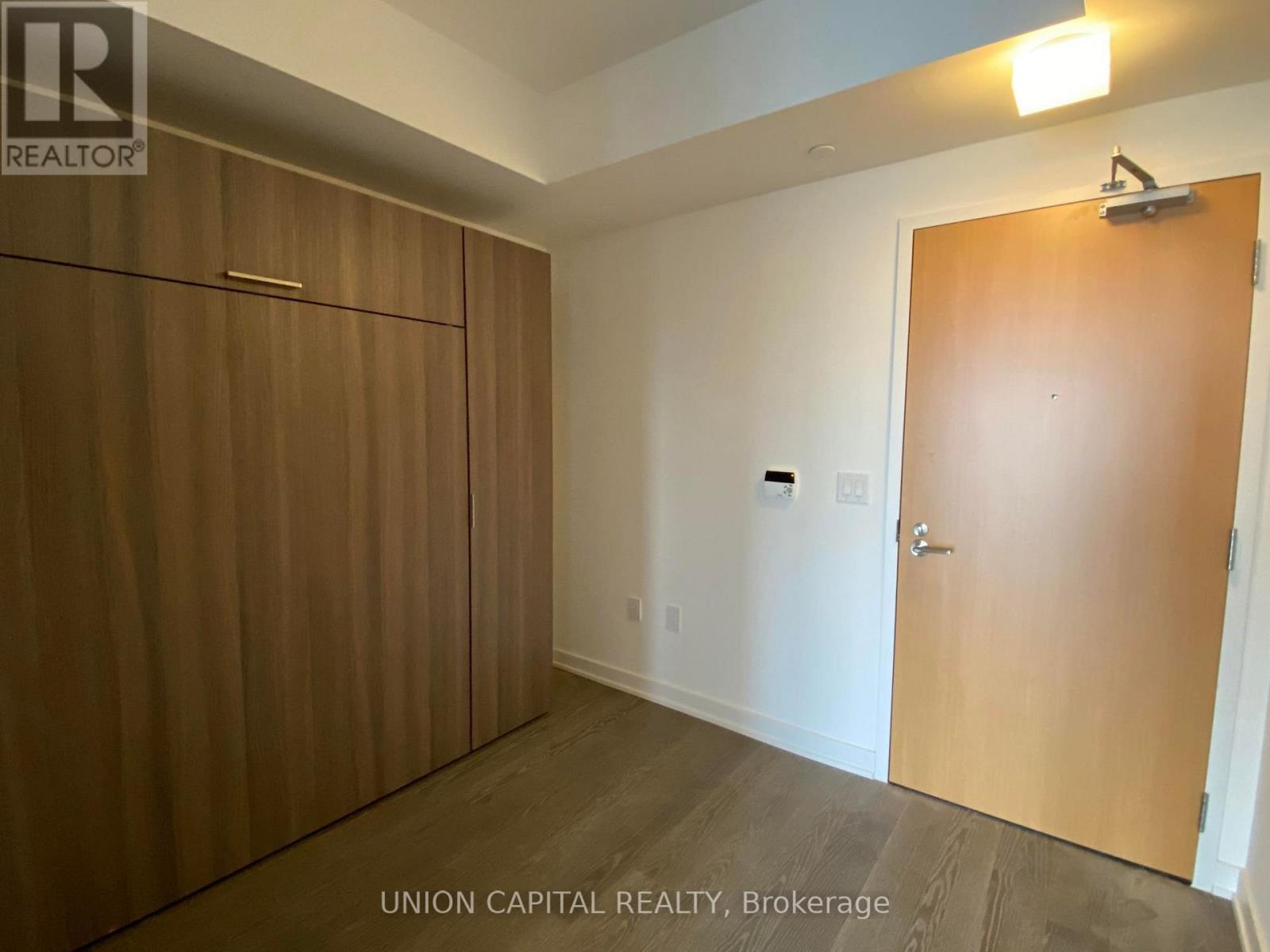 4909 - 11 Wellesley Street W, Toronto, ON - Indoor Photo Showing Other Room