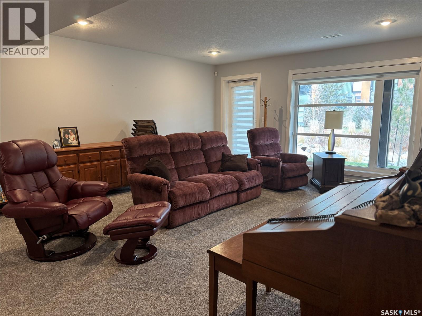 21 103 Pohorecky Crescent, Saskatoon, SK - Indoor Photo Showing Living Room