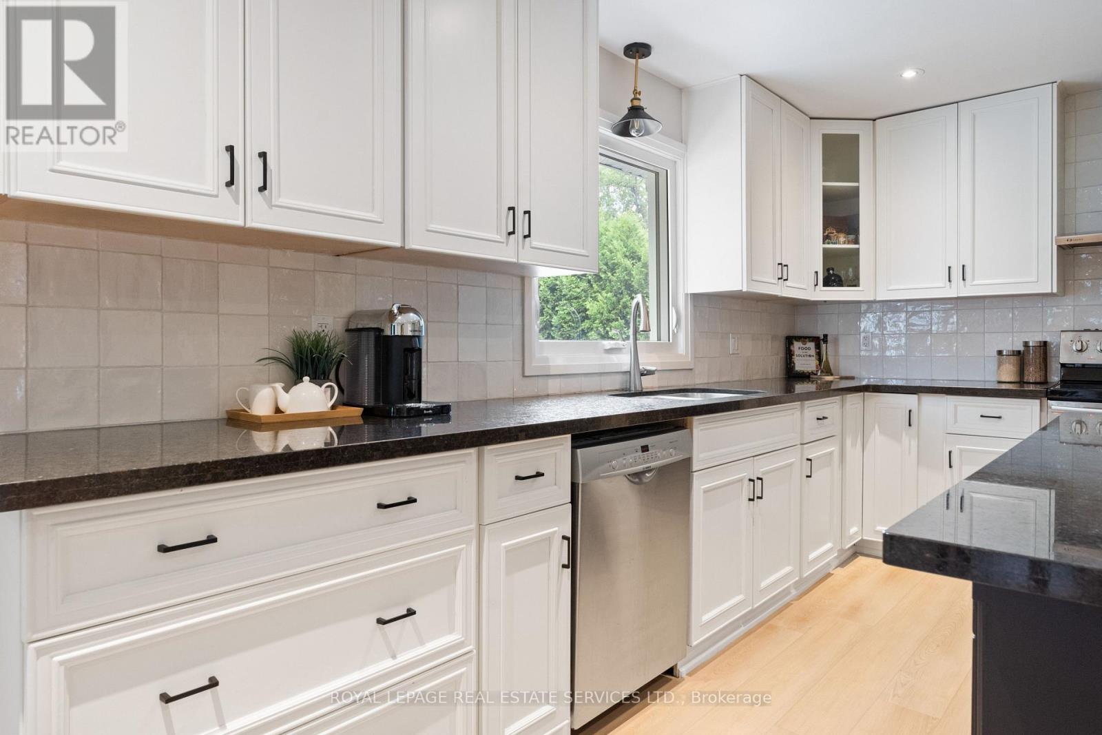 Gorgeous Kitchen Complete with Quartz Countertops - 136 Mohawk Road, Hamilton, ON - Indoor Photo Showing Kitchen