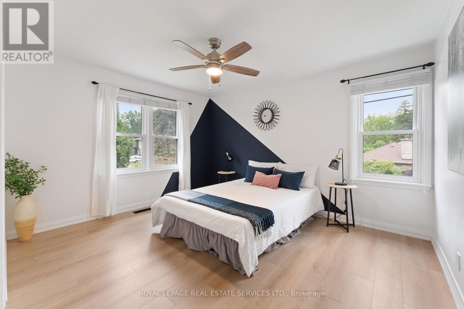 Second Bedroom with Luxury Vinyl Plank Flooring - 136 Mohawk Road, Hamilton, ON - Indoor Photo Showing Bedroom