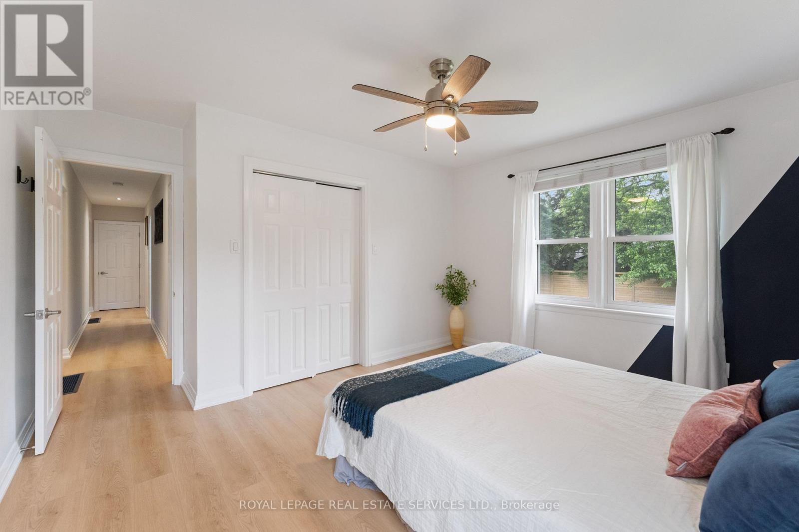 Second Bedroom with Luxury Vinyl Plank Flooring - 136 Mohawk Road, Hamilton, ON - Indoor Photo Showing Bedroom