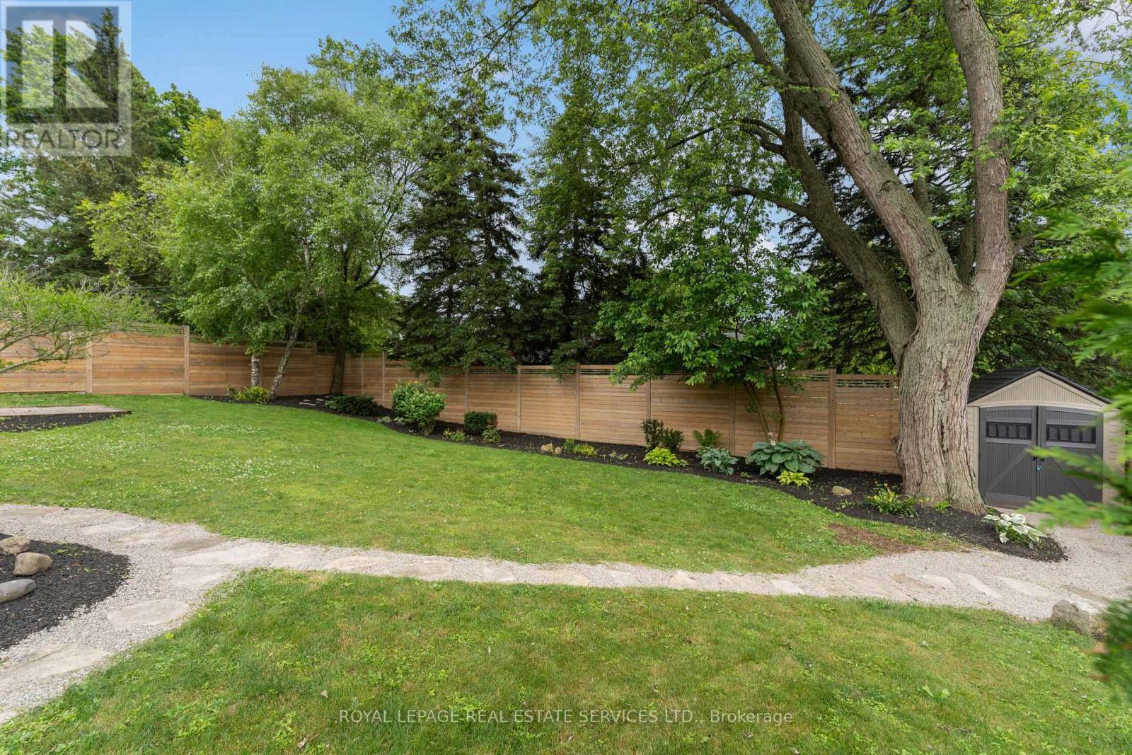 Enjoy Beautifully Landscaped Gardens and Walkways - 136 Mohawk Road, Hamilton, ON - Outdoor