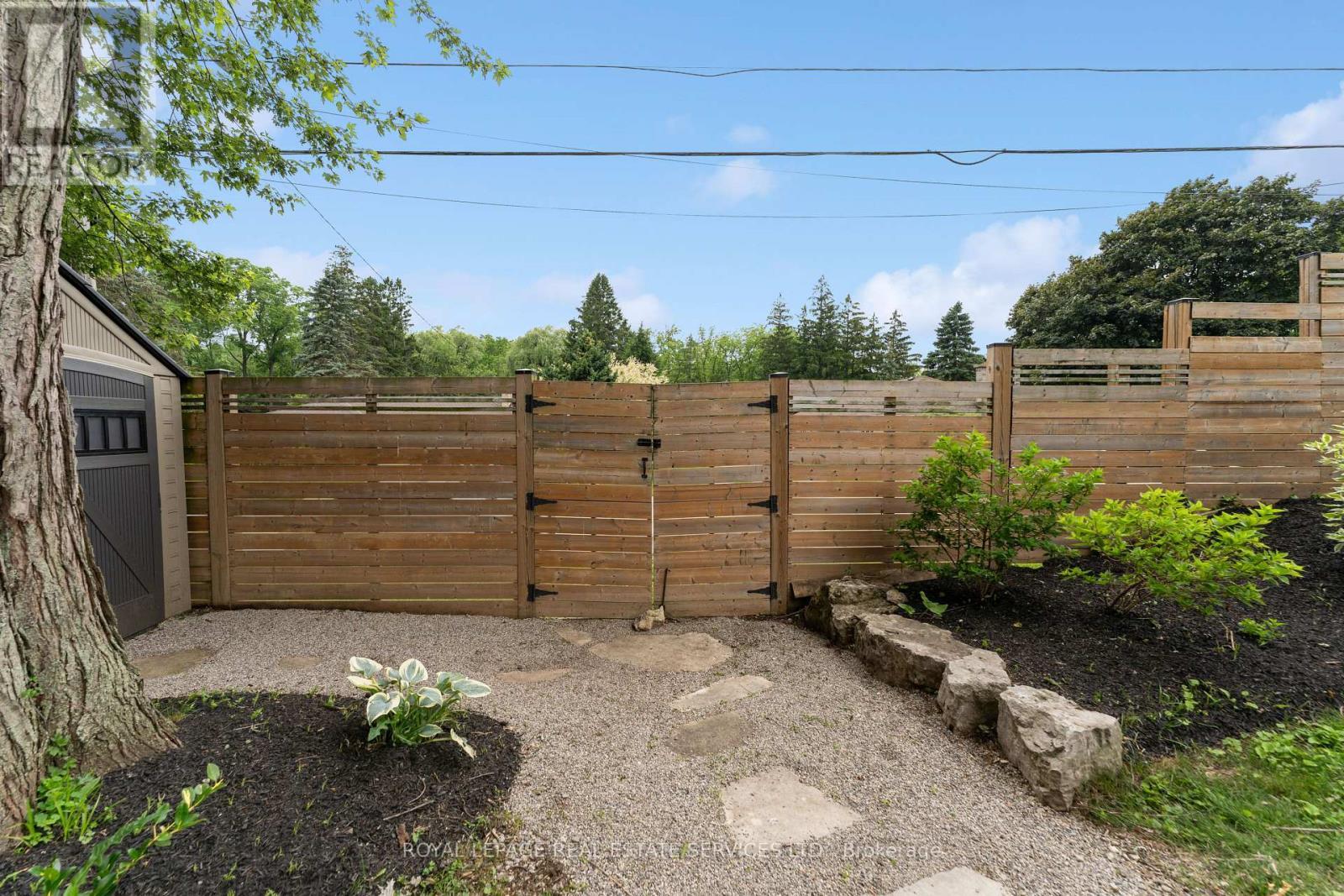 Enjoy Beautifully Landscaped Gardens and Walkways - 136 Mohawk Road, Hamilton, ON - Outdoor