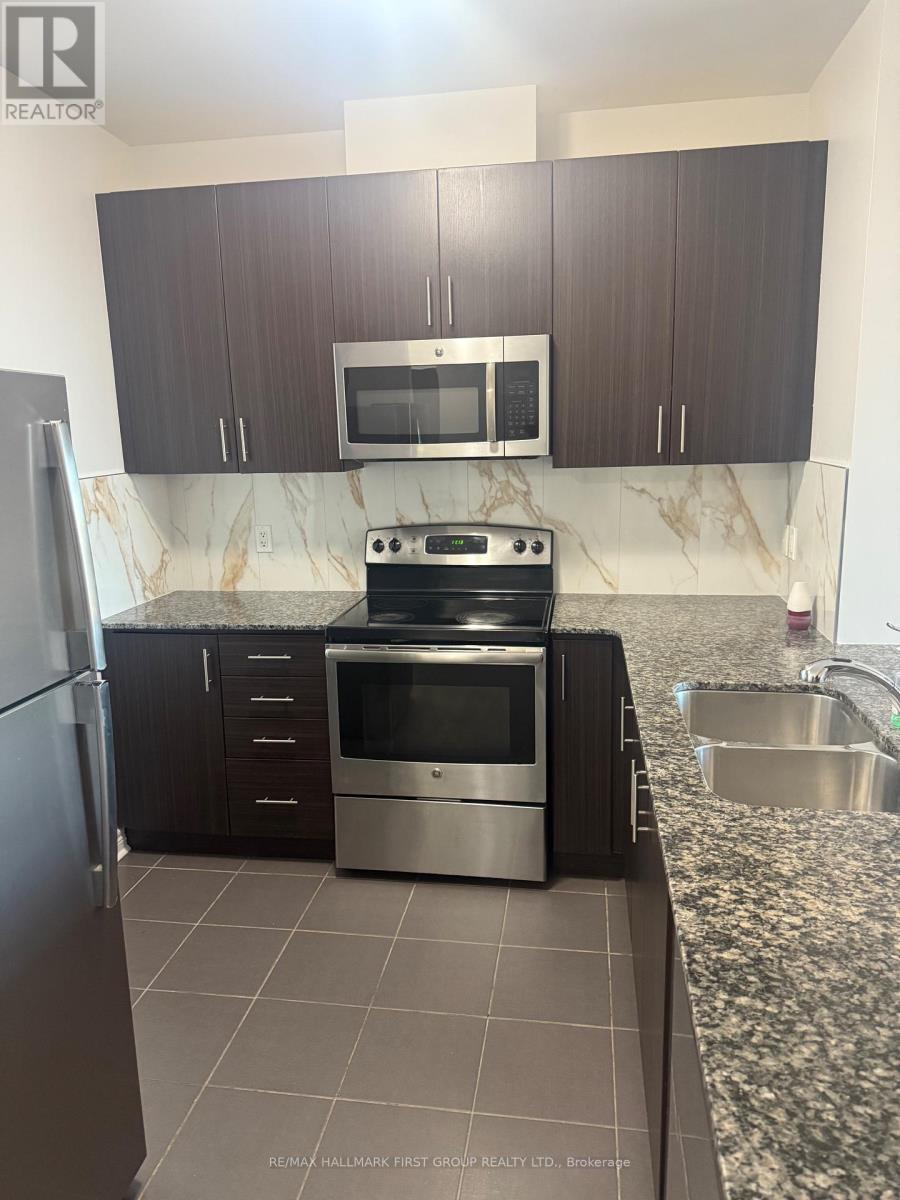 310 - 7768 Kennedy Road, Markham, ON - Indoor Photo Showing Kitchen With Double Sink With Upgraded Kitchen