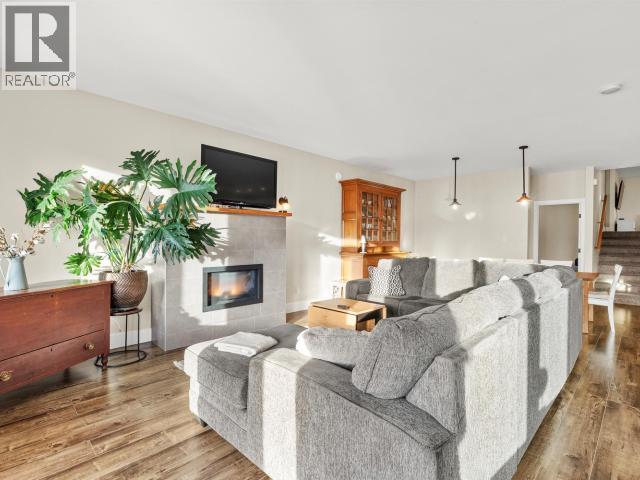 24 Nighthawk Valley Lane, Whitehorse North, YT - Indoor Photo Showing Living Room With Fireplace