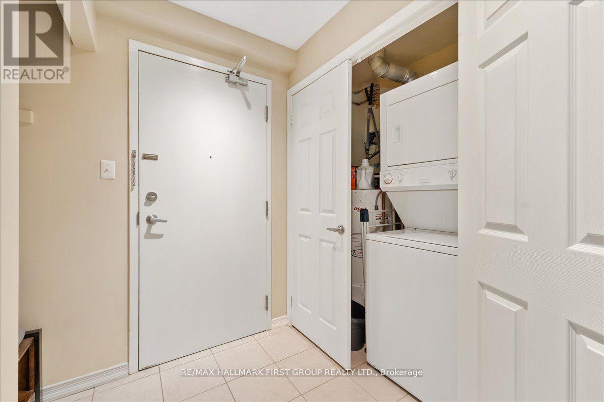 204 - 132 Aspen Springs Drive, Clarington (Bowmanville), ON - Indoor Photo Showing Laundry Room