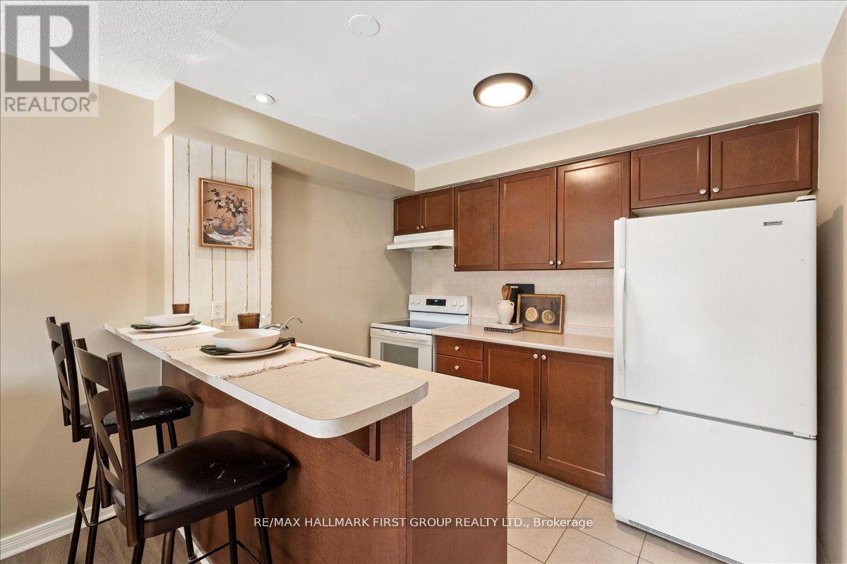 204 - 132 Aspen Springs Drive, Clarington (Bowmanville), ON - Indoor Photo Showing Kitchen