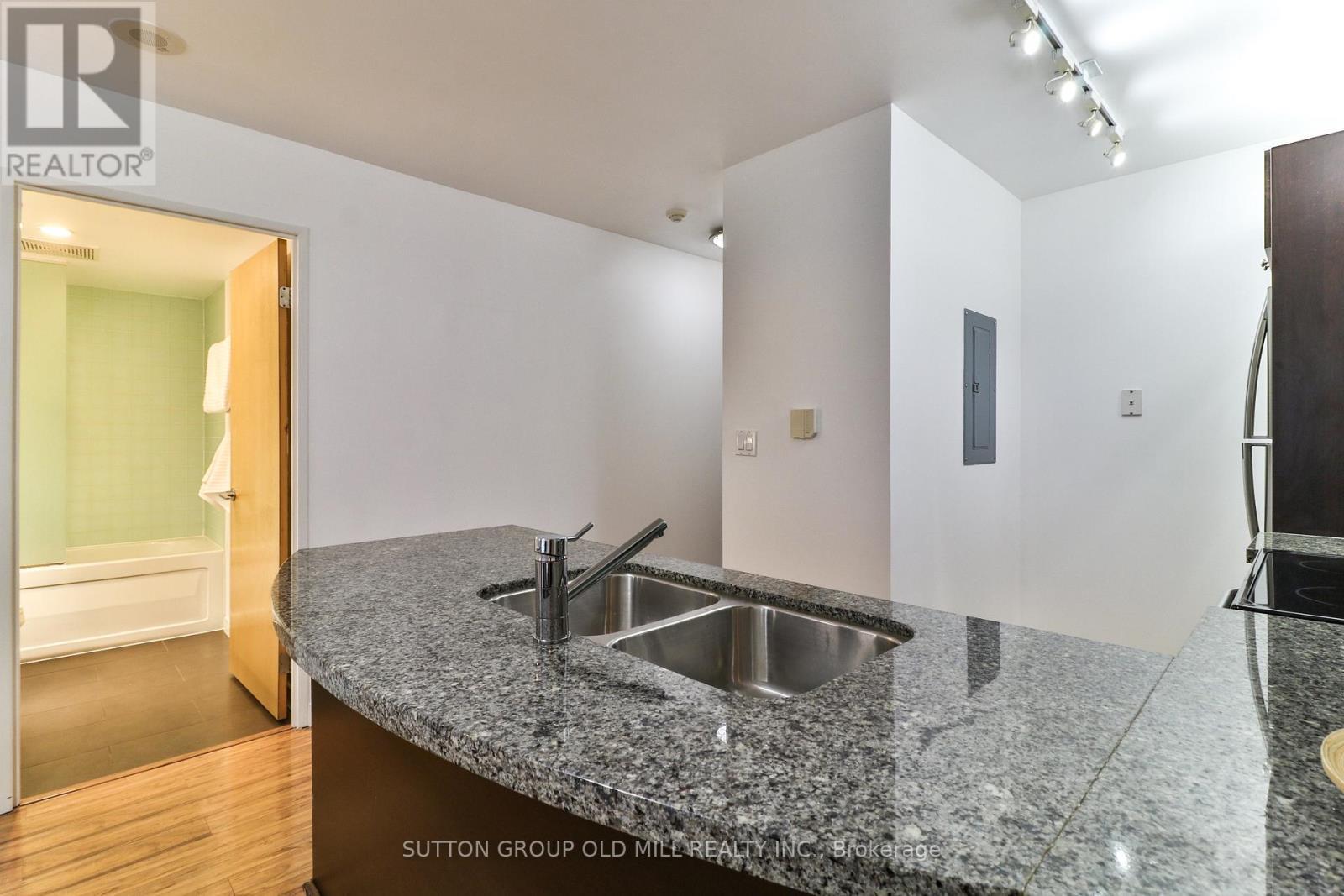 205 - 1005 King Street W, Toronto, ON - Indoor Photo Showing Kitchen With Double Sink