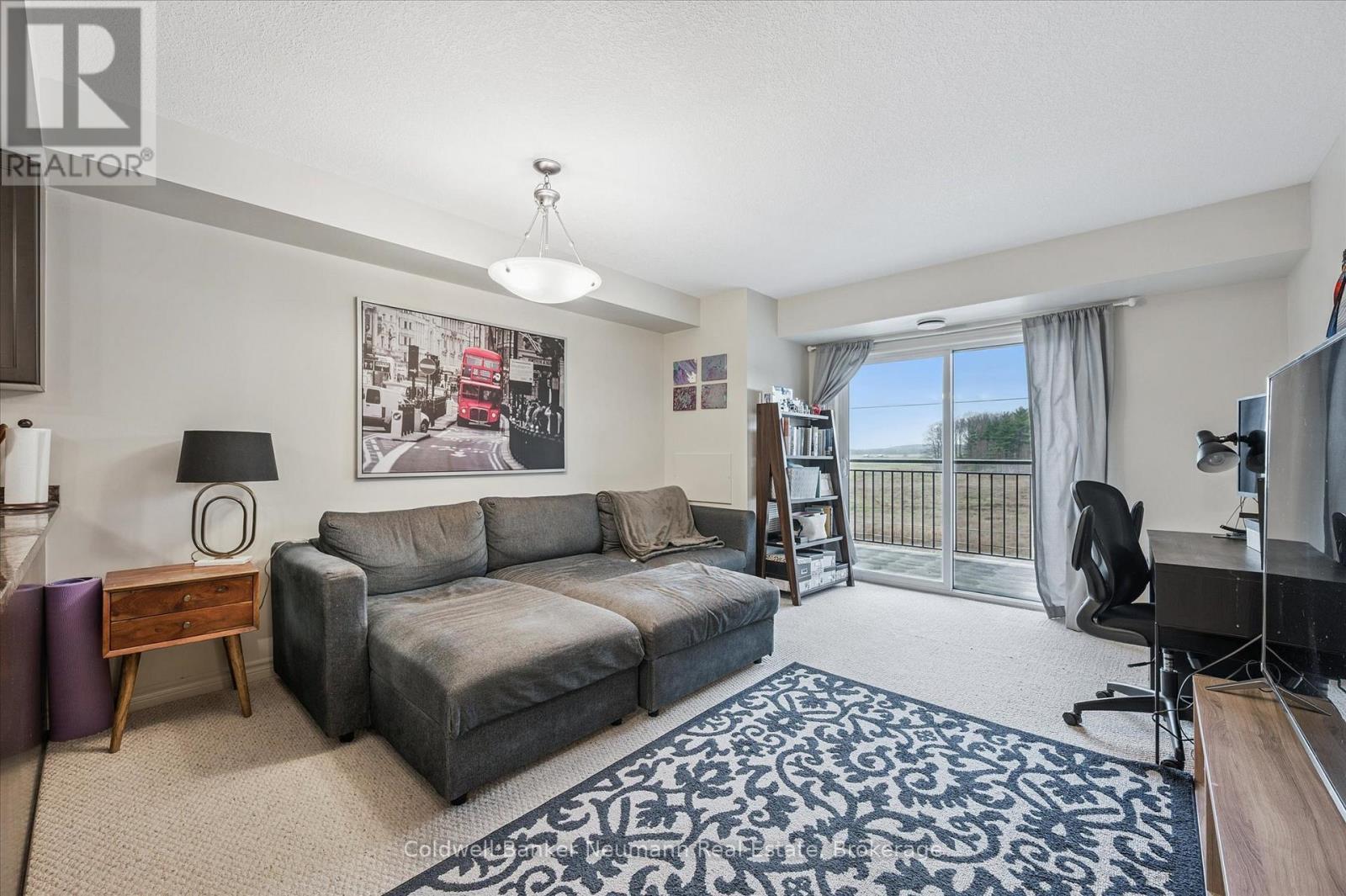 406 - 45 Kingsbury Square, Guelph (Pineridge/Westminster Woods), ON - Indoor Photo Showing Living Room