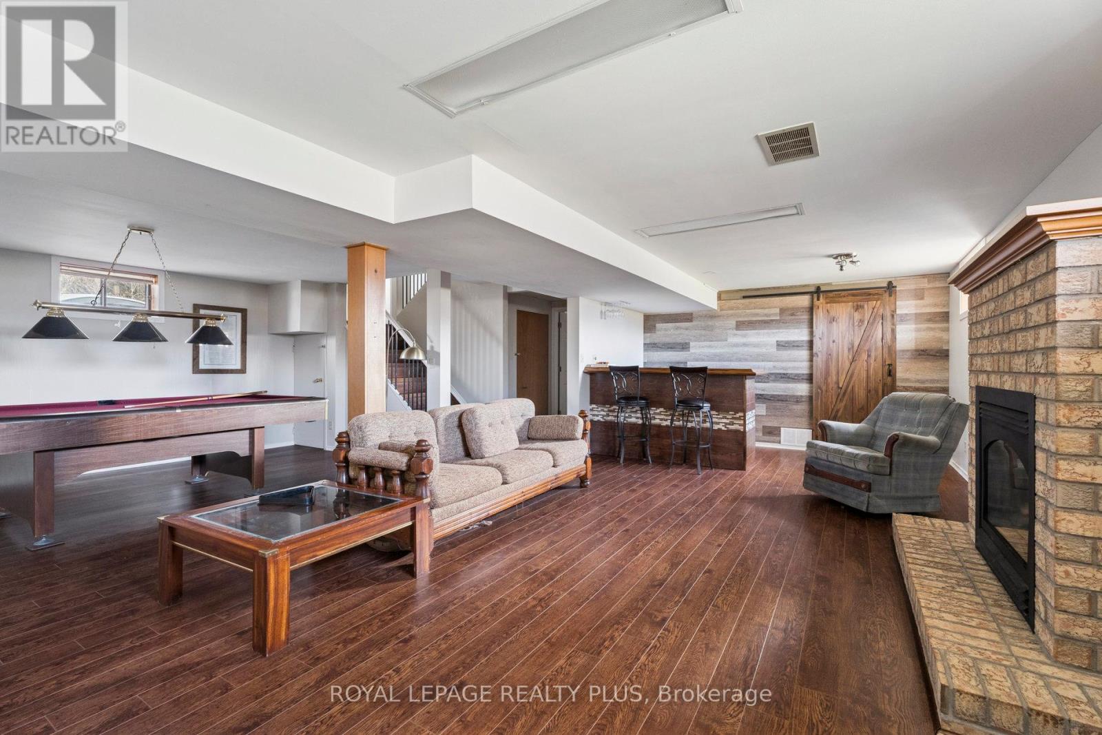 7719 Poplar Side Road, Clearview, ON - Indoor Photo Showing Living Room With Fireplace