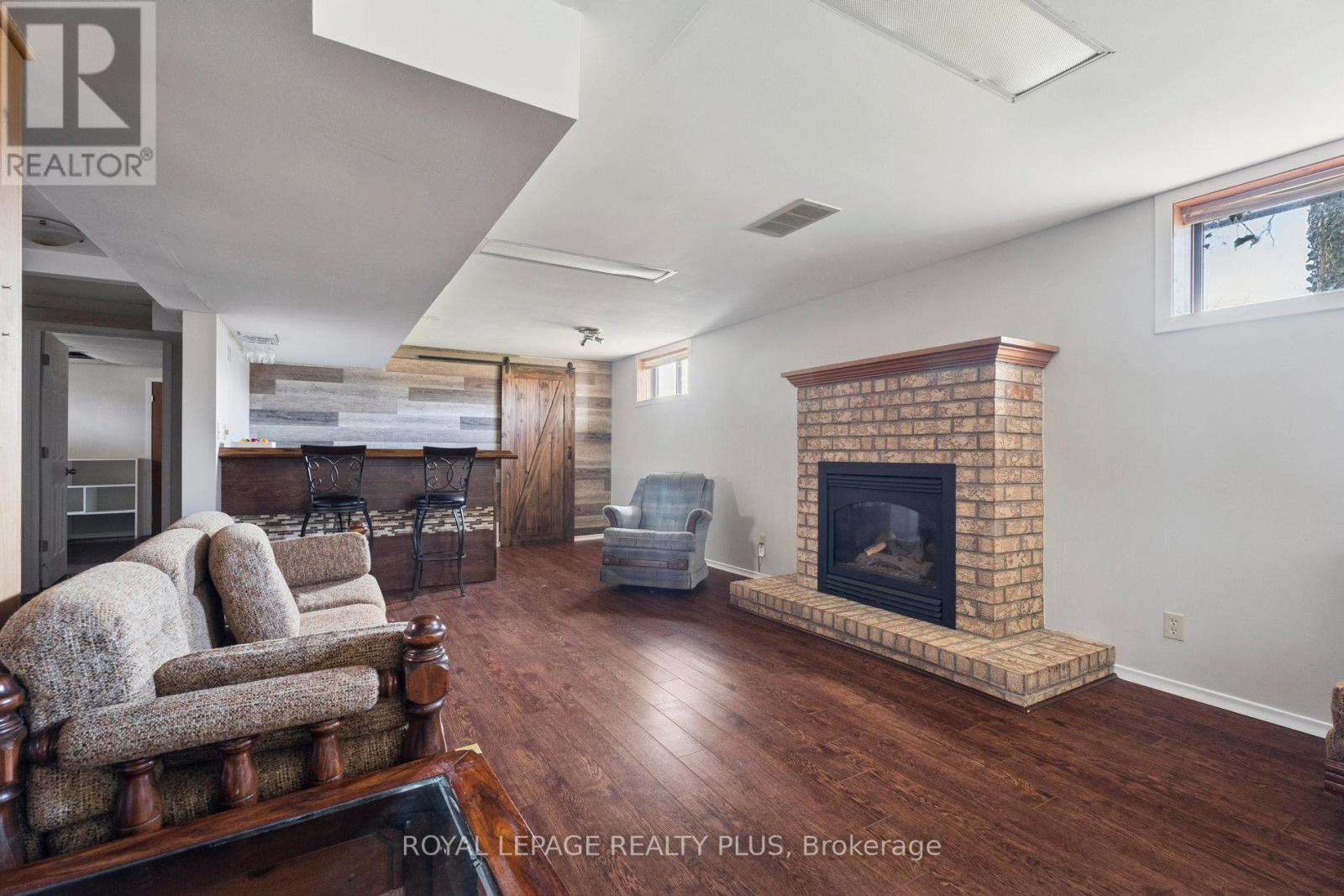 7719 Poplar Side Road, Clearview, ON - Indoor Photo Showing Living Room With Fireplace