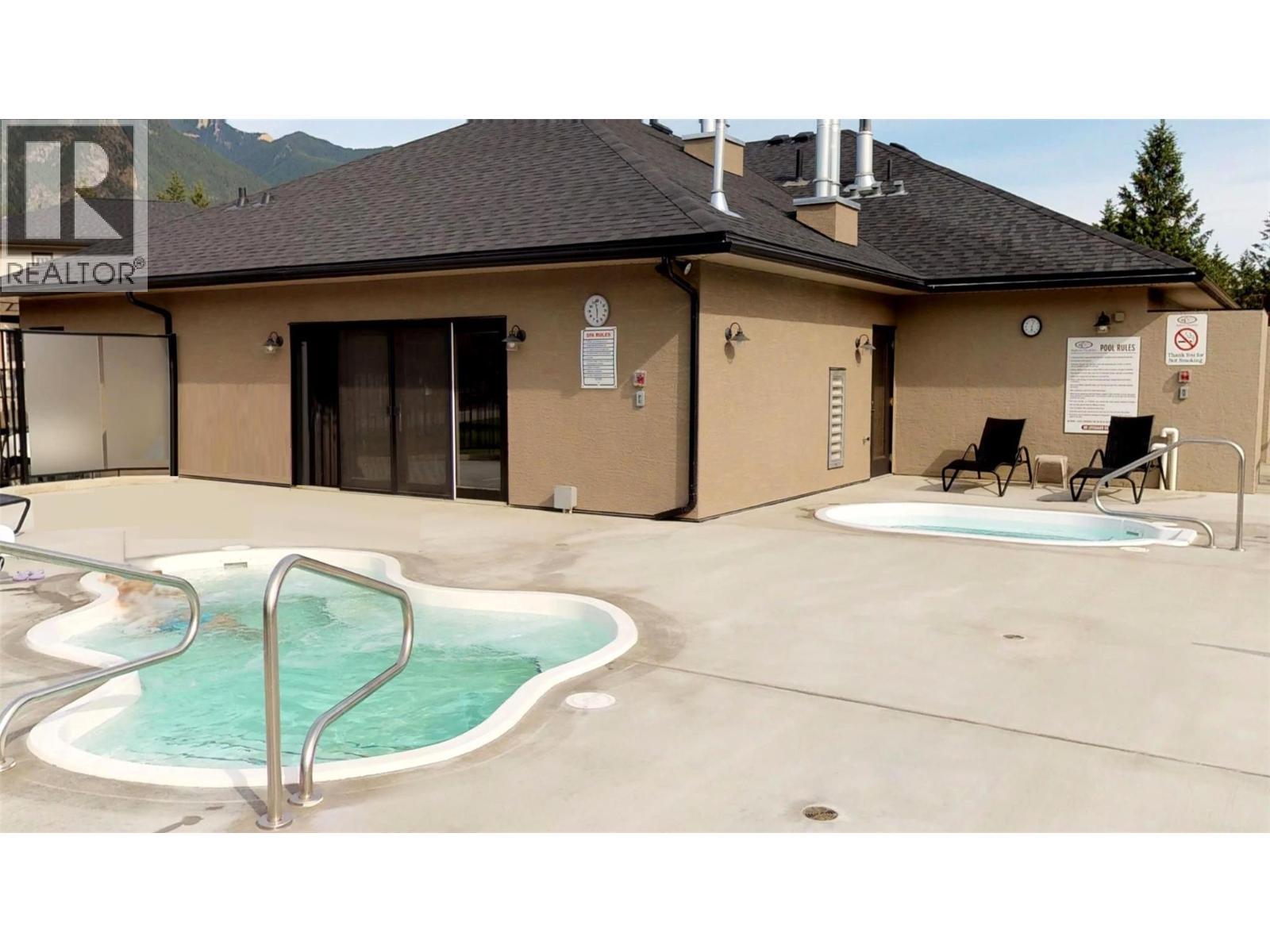 700 Bighorn Boulevard Unit# 735 M1, Radium Hot Springs, BC - Outdoor With In Ground Pool