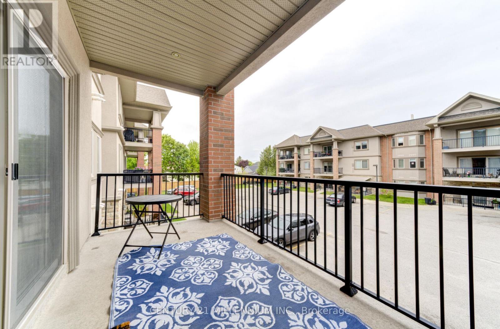 208 - 19A Yonge Street N, Springwater, ON - Outdoor With Balcony With Exterior