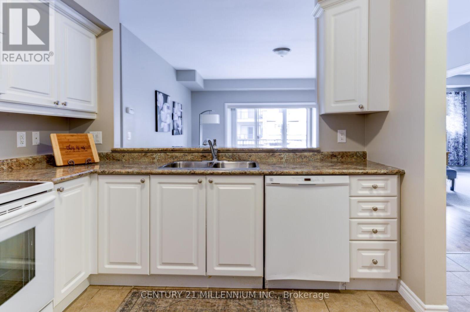 208 - 19A Yonge Street N, Springwater, ON - Indoor Photo Showing Kitchen With Double Sink