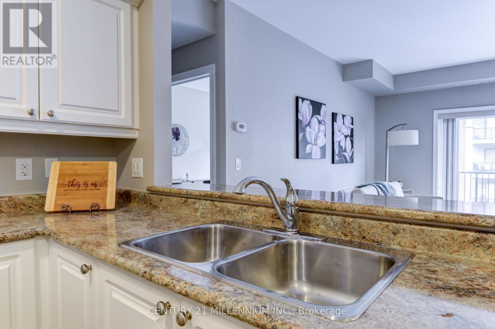208 - 19A Yonge Street N, Springwater, ON - Indoor Photo Showing Kitchen With Double Sink