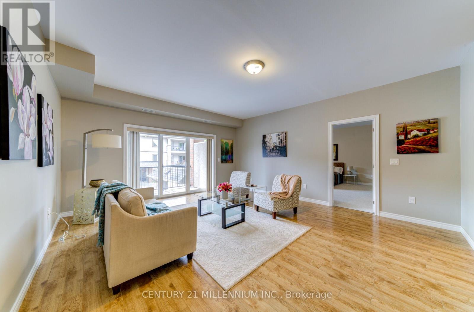 208 - 19A Yonge Street N, Springwater, ON - Indoor Photo Showing Living Room
