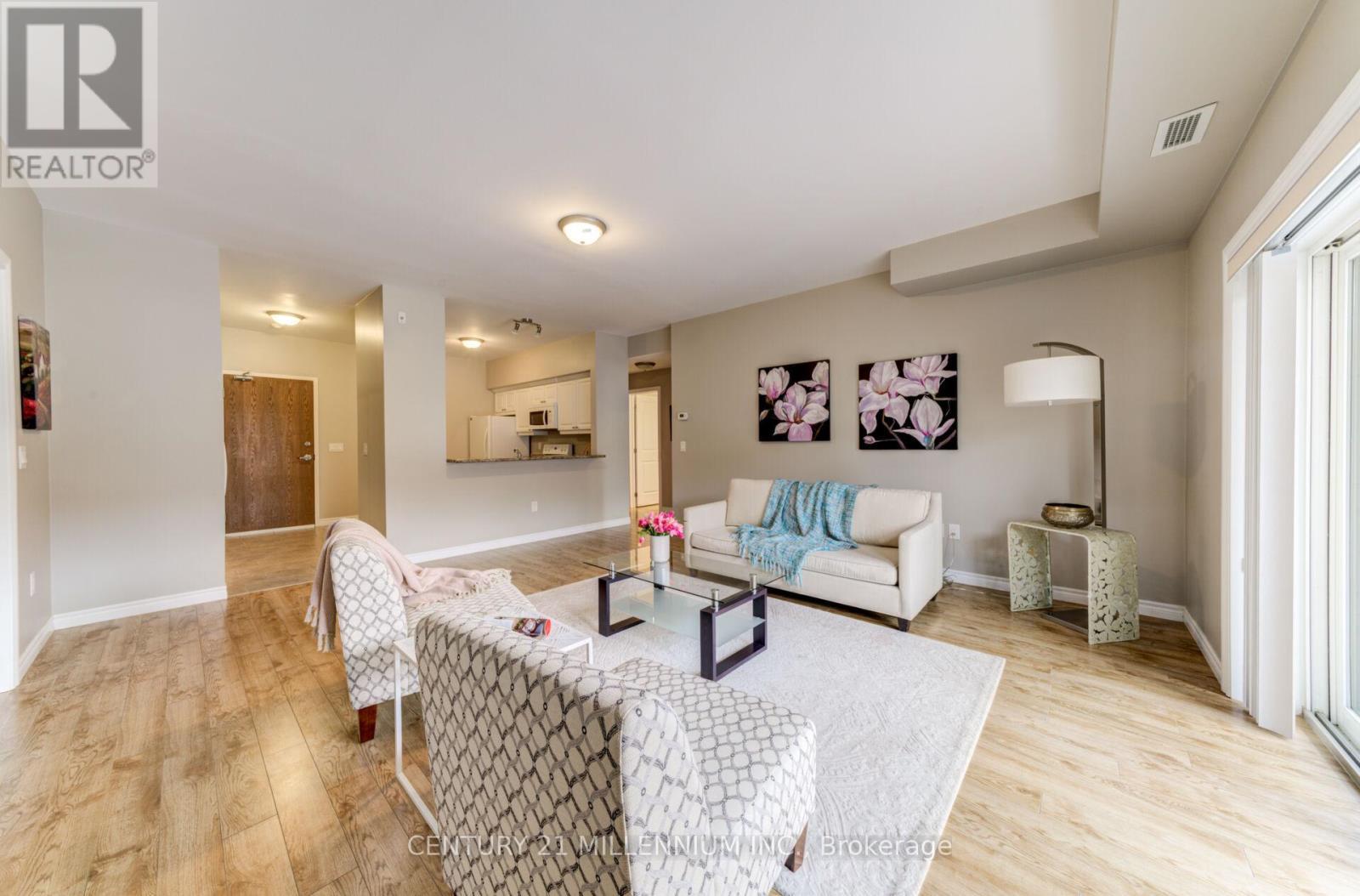 208 - 19A Yonge Street N, Springwater, ON - Indoor Photo Showing Living Room