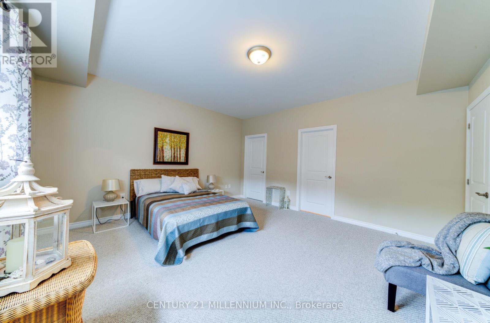 208 - 19A Yonge Street N, Springwater, ON - Indoor Photo Showing Bedroom