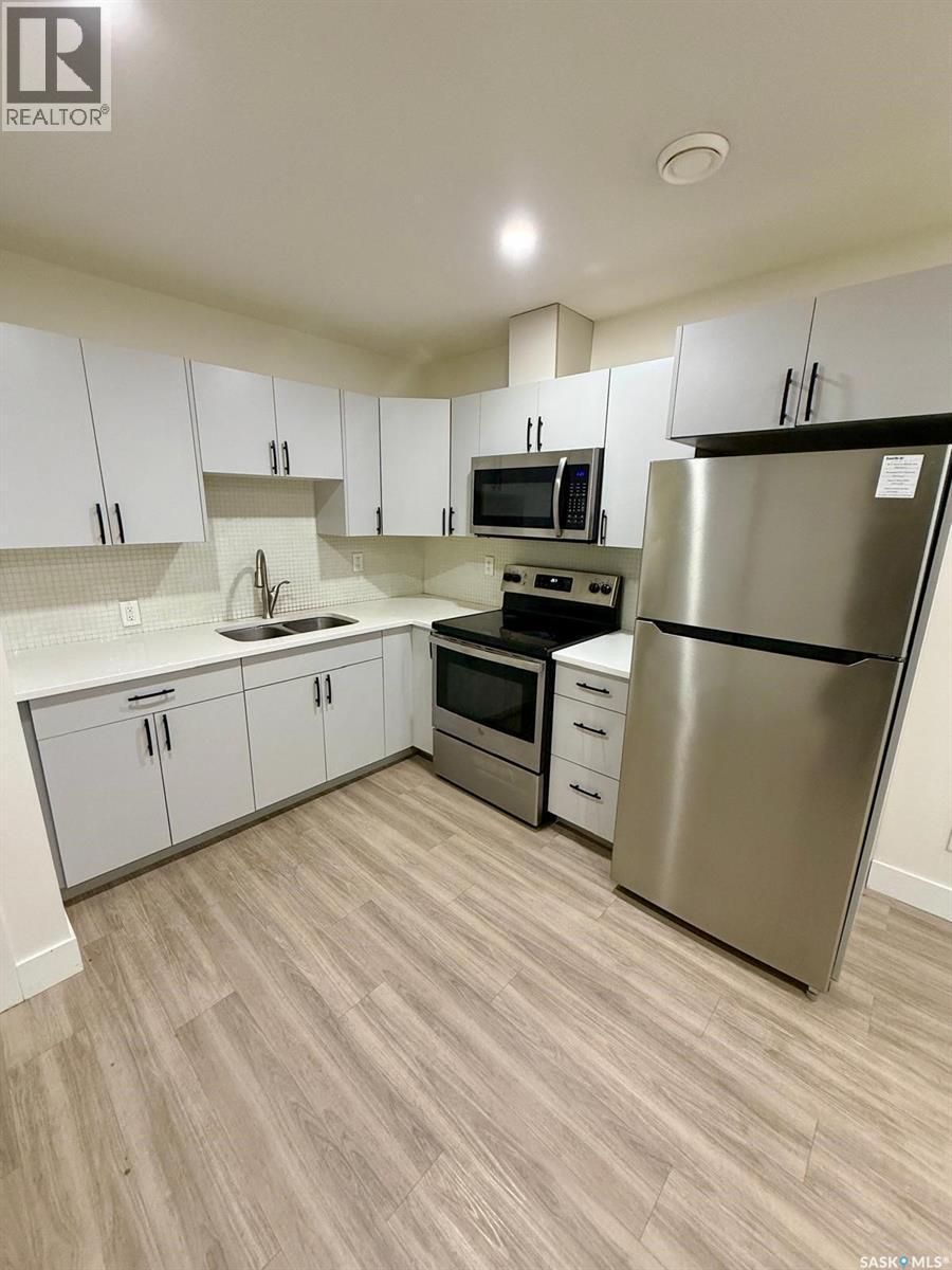 3214 Green Brook Road, Regina, SK - Indoor Photo Showing Kitchen With Stainless Steel Kitchen With Double Sink