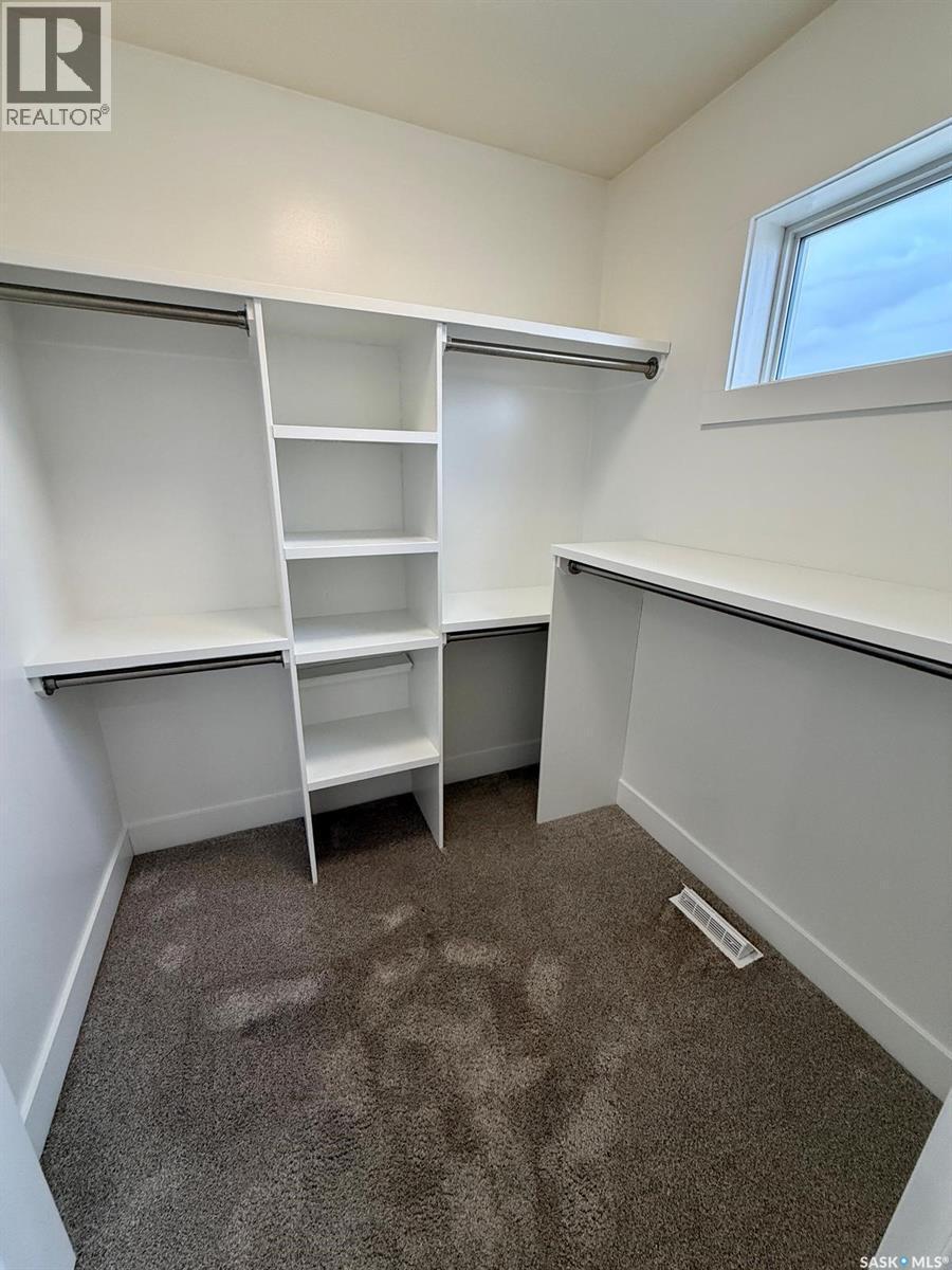 3214 Green Brook Road, Regina, SK - Indoor With Storage