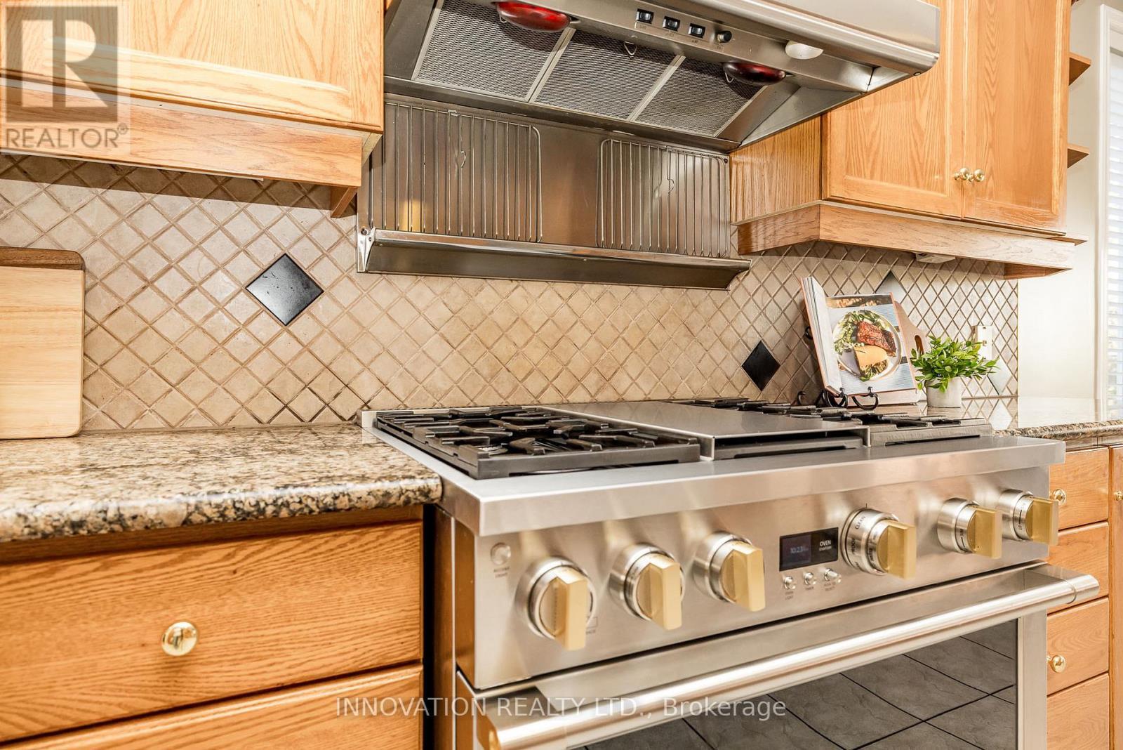 Monogram Gas stove with grill - 25 Kyle Avenue, Ottawa, ON - Indoor Photo Showing Kitchen With Upgraded Kitchen
