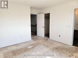 Primary Bedroom w/ Walk-in Closet and Ensuite -