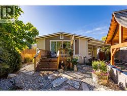 Stairs down from the primary bedroom deck. -