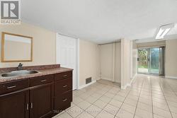 Rec Room walkout to fenced yard & gate to park -