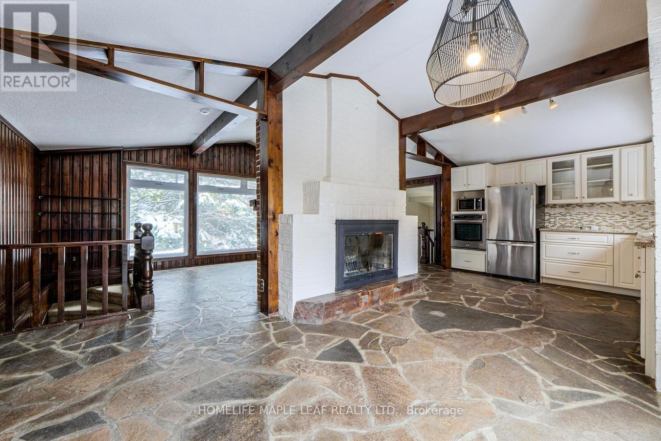 253048 9Th Line, Amaranth, ON - Indoor With Fireplace