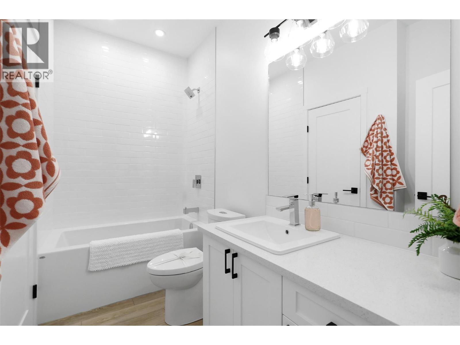 Upgraded Bathroom (not included in base model price). - 8900 Jim Bailey Road Unit# 167, Kelowna, BC