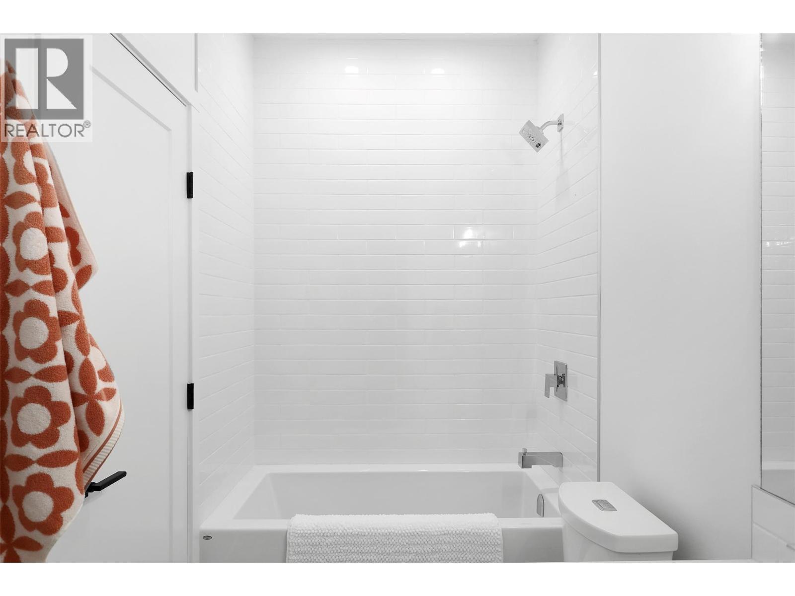 Upgraded Bathroom (not included in base model price). - 8900 Jim Bailey Road Unit# 167, Kelowna, BC
