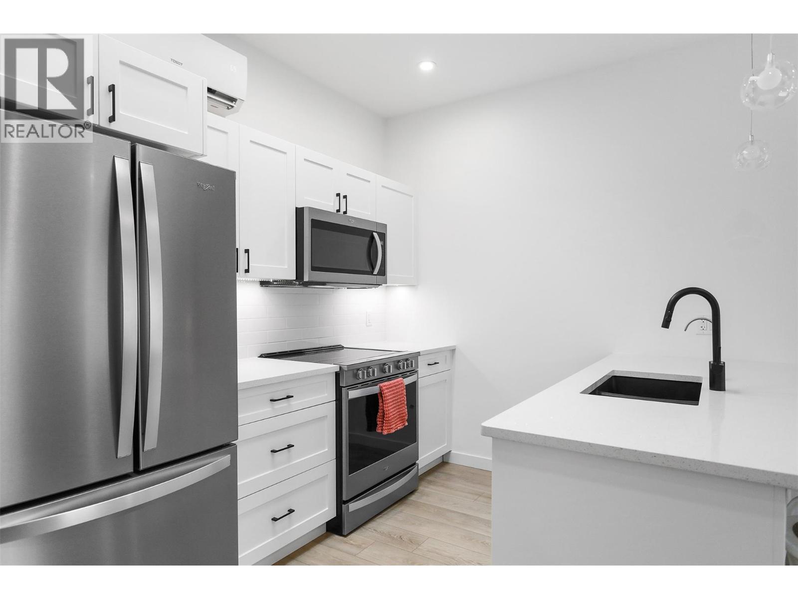 Upgraded Kitchen & Appliance Upgrade (not included in base model price). - 8900 Jim Bailey Road Unit# 167, Kelowna, BC