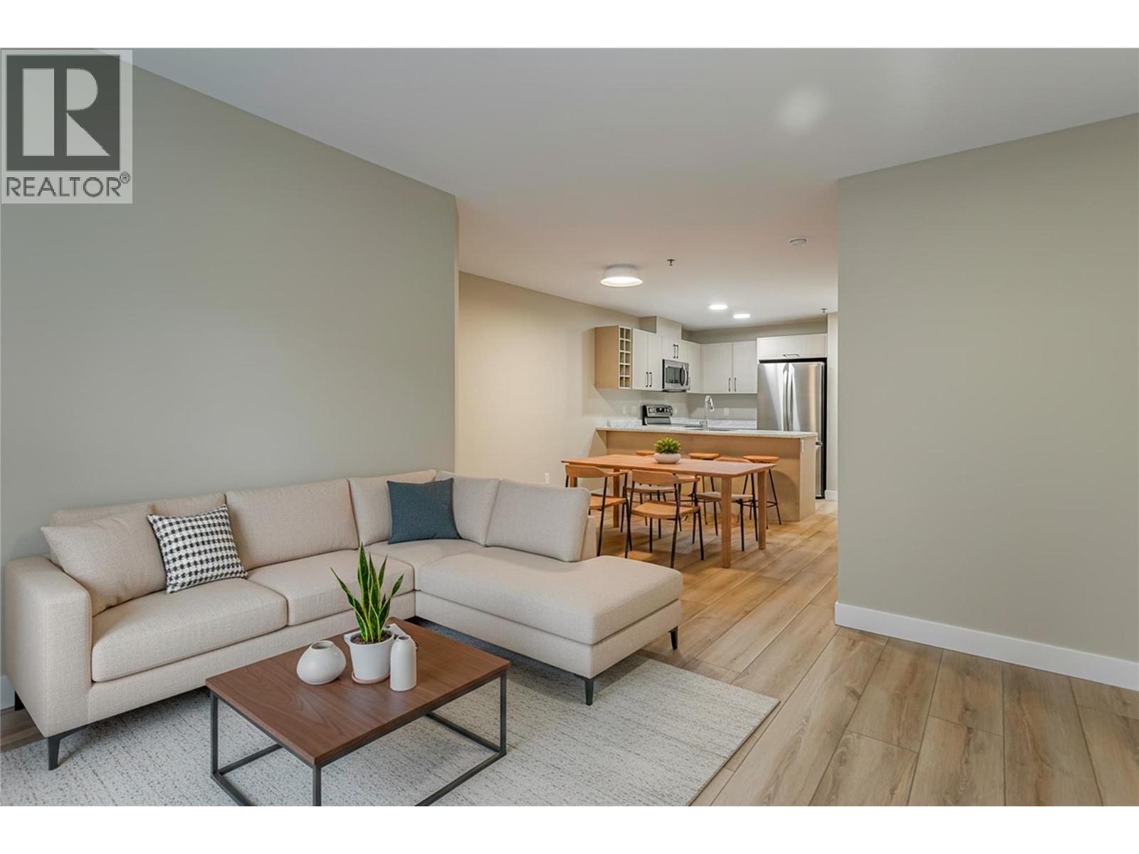 living area - virtually staged - 1099 Sunset Drive Unit# 230, Kelowna, BC - Indoor Photo Showing Living Room