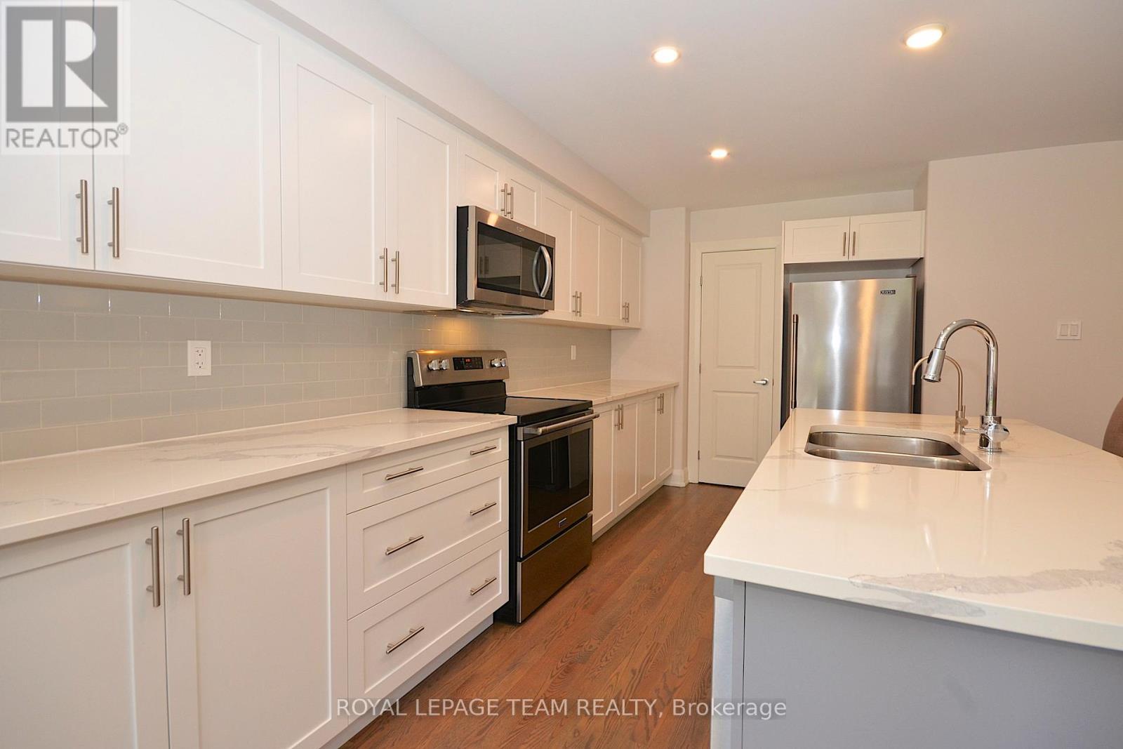 331 Proud Walk Drive Drive S, Ottawa, ON - Indoor Photo Showing Kitchen With Double Sink