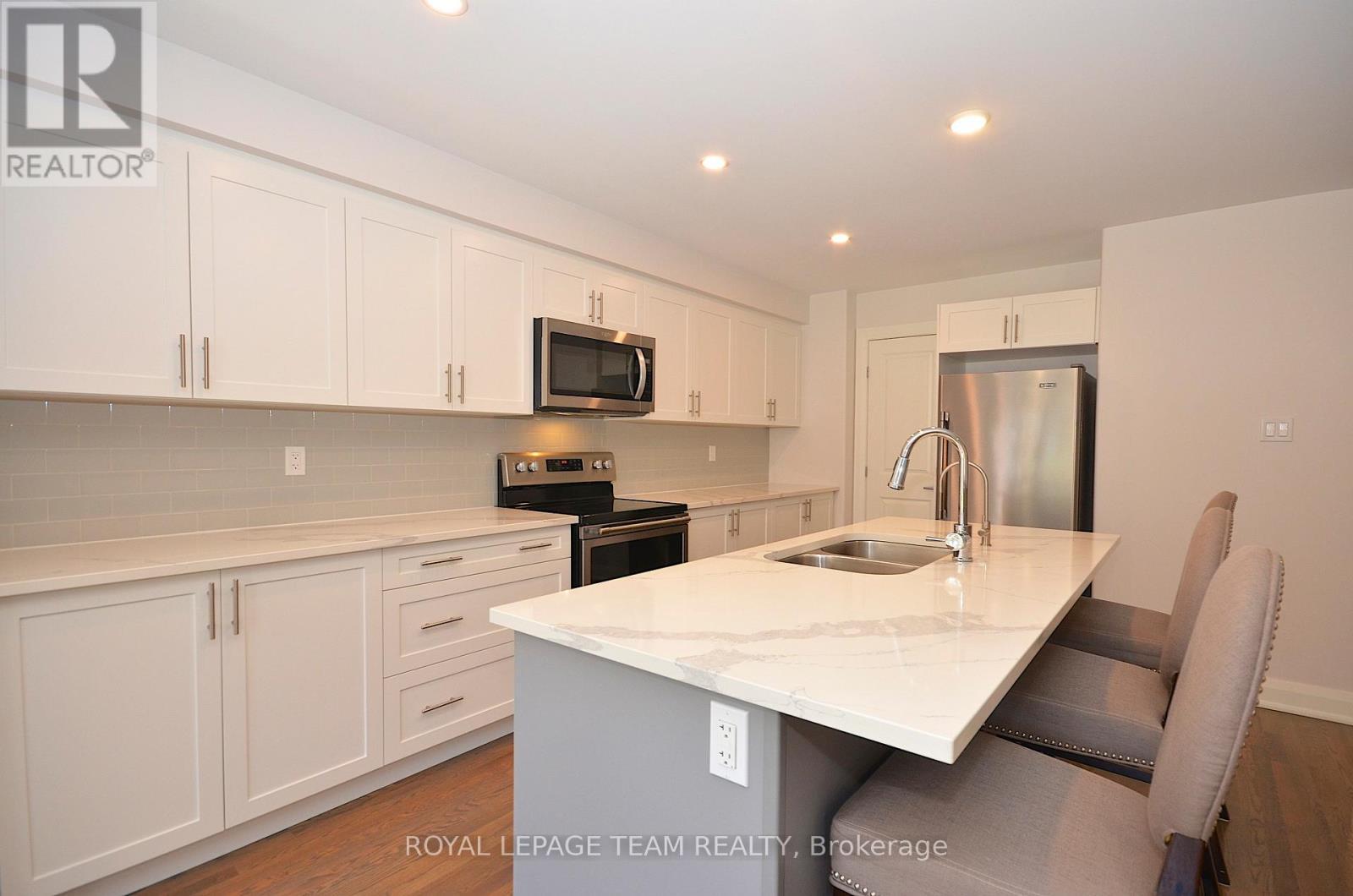 331 Proud Walk Drive Drive S, Ottawa, ON - Indoor Photo Showing Kitchen With Double Sink